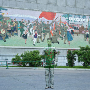 Liu Bolin, Hiding in North Korea – The Theater Mural, 2018, Archival pigment print, 112.5 x 150 cm