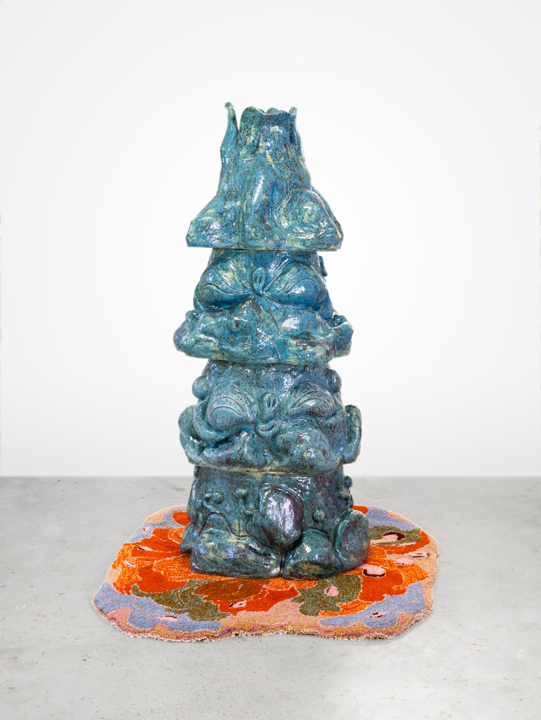Mira Makai, Endless Blooming, 2025, glazed ceramic and textile, 135 x 45 x 55 cm